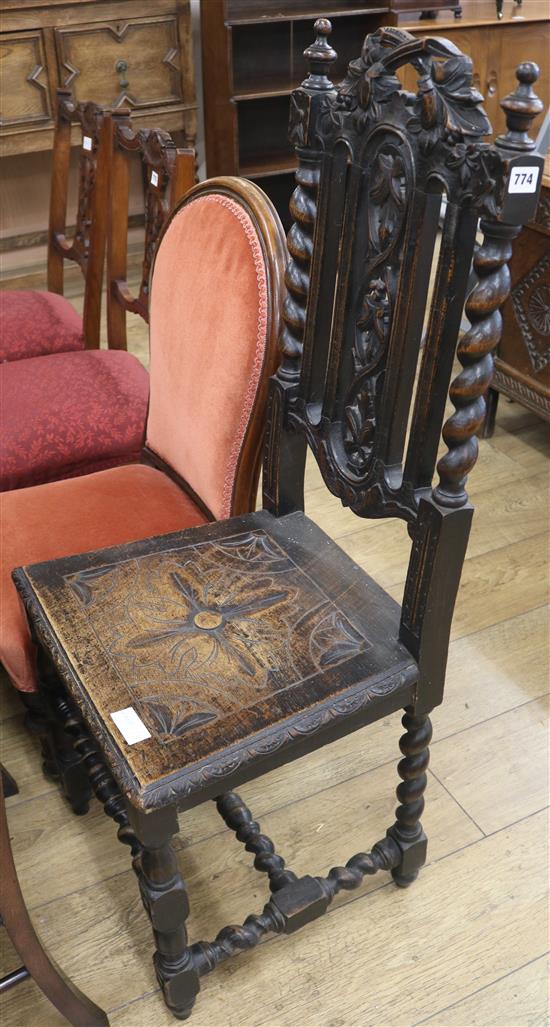 A late Victorian Carolean style oak wood seat dining chair and a small Victorian upholstered mahogany nursing chair